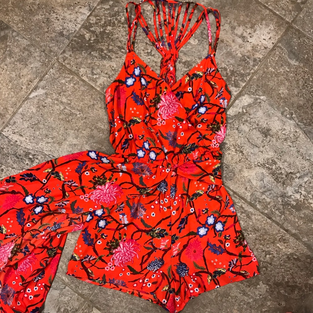 Candie’s Strappy Floral Romper w/ High-Low Skirt